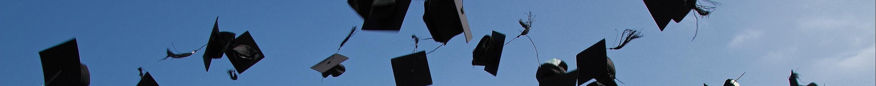 mortarboards tossed in the air