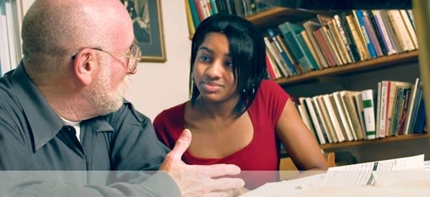 student talking to professor