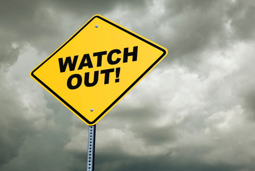 yield sign reading watch out